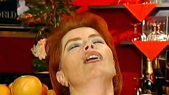 Redhead mom Kira Red fucks in her mouth